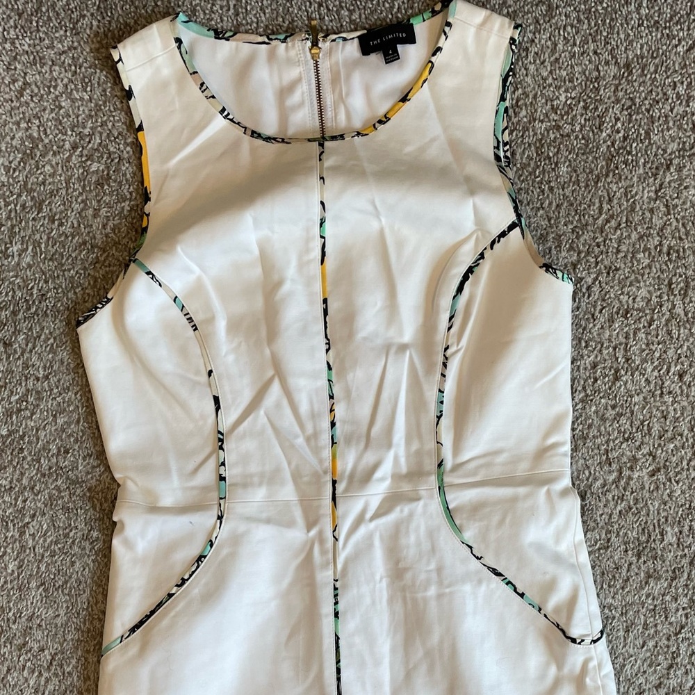 White dress with colorful detail trim